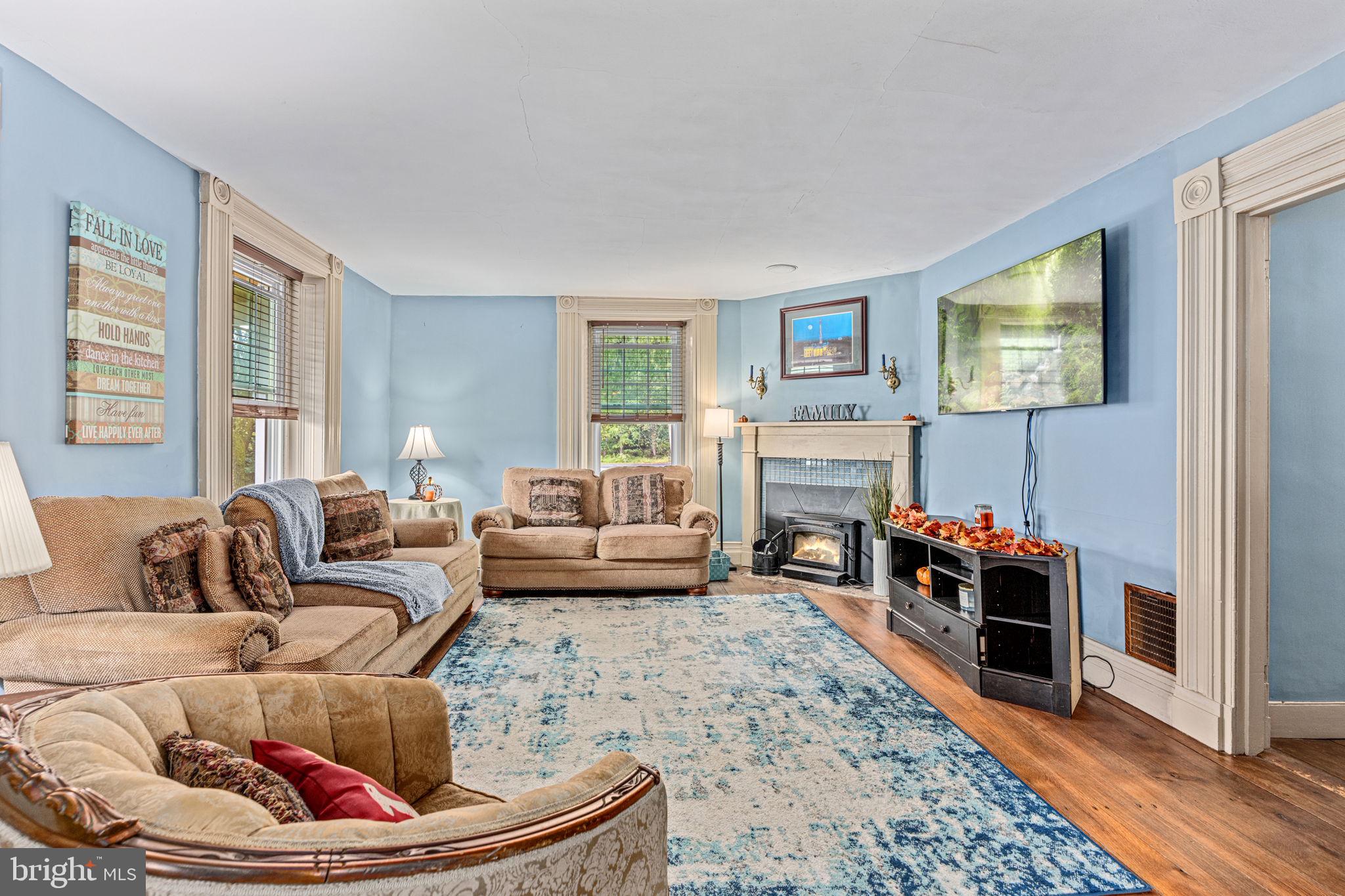 4701 Edges Mill Road Downingtown, PA 19335 - Photo 25 of 55 a living room with furniture and a flat screen tv