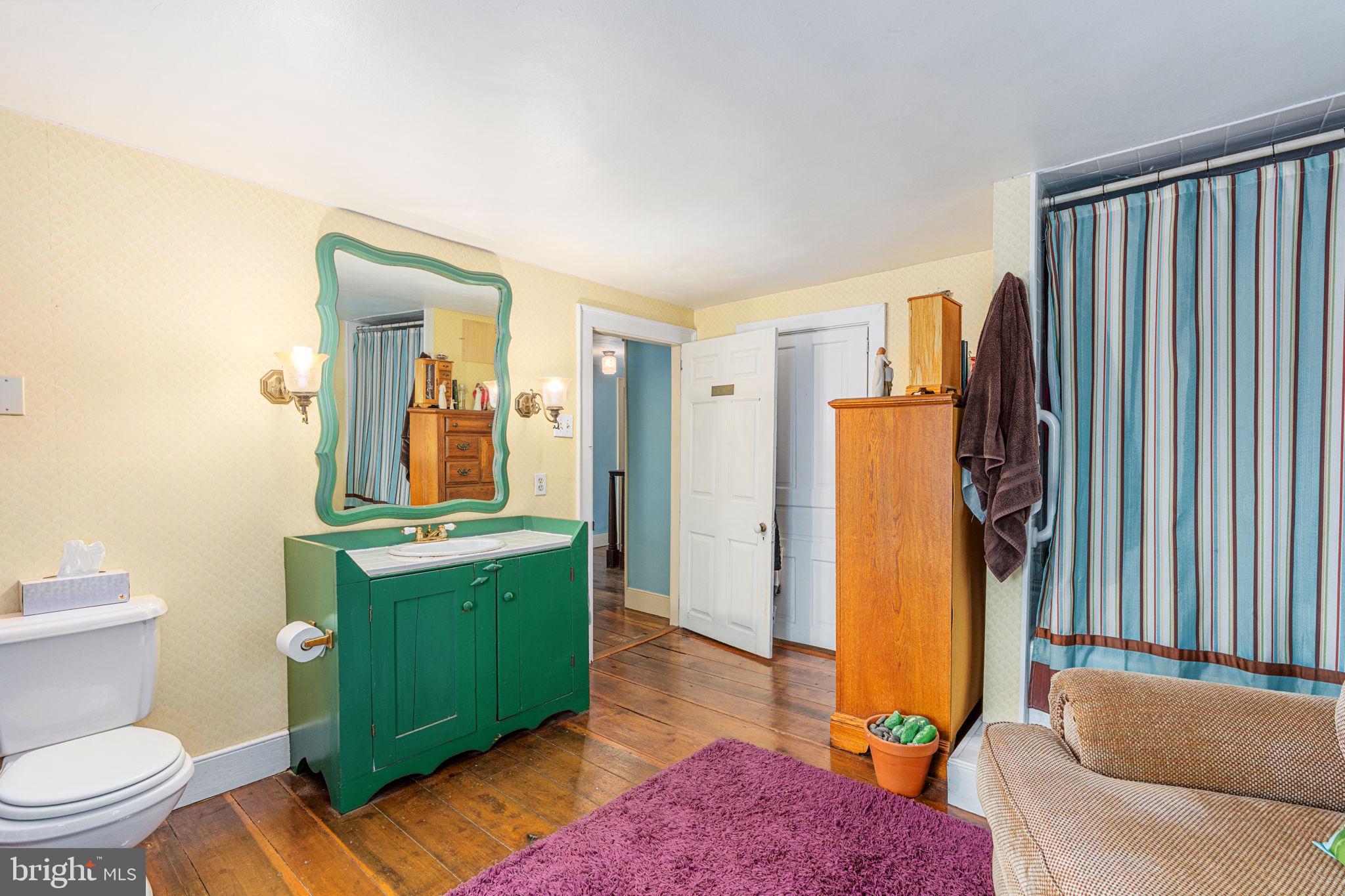 4701 Edges Mill Road Downingtown, PA 19335 - Photo 29 of 55 a bathroom with a sink toilet and shower