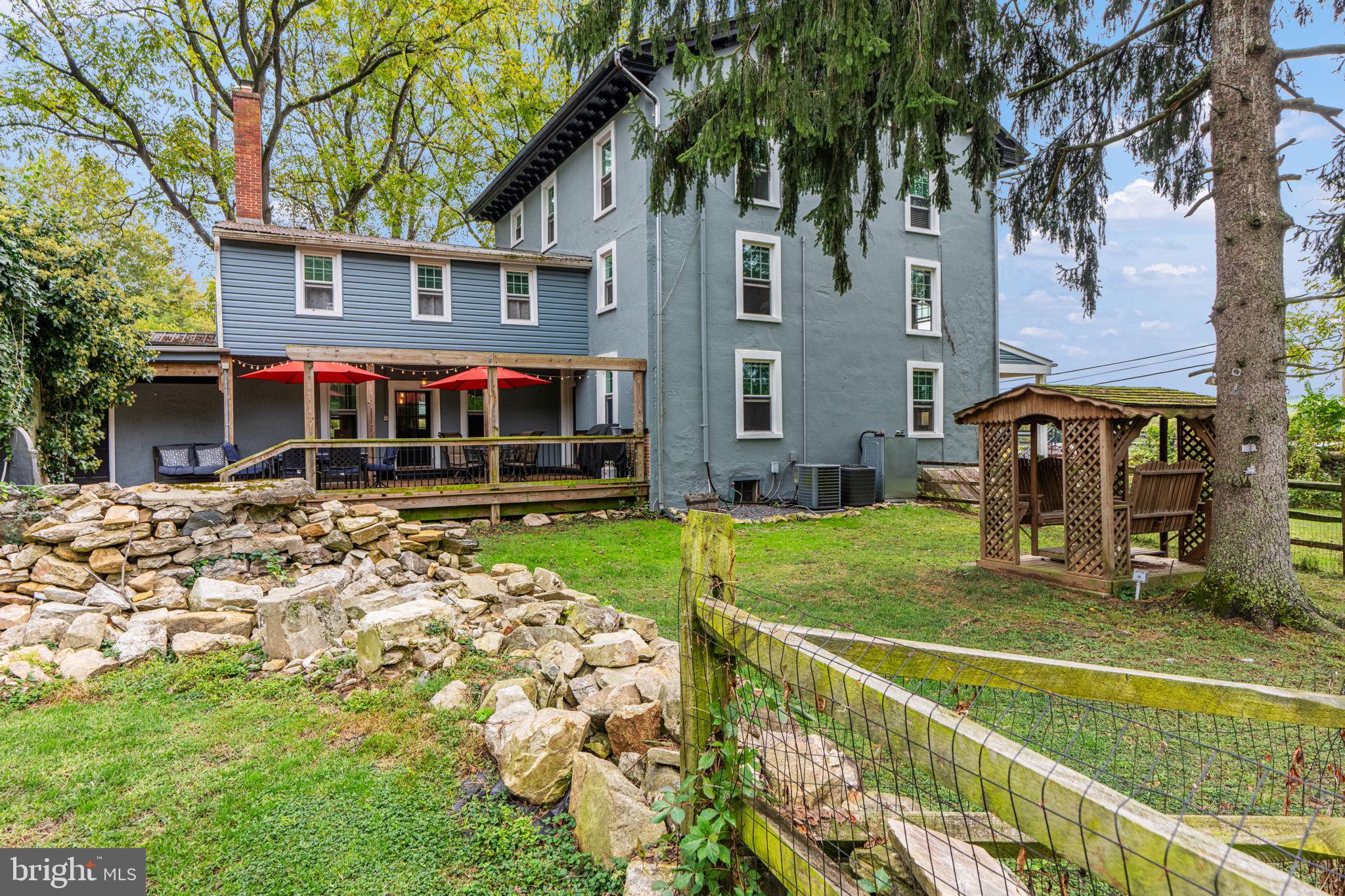 4701 Edges Mill Road Downingtown, PA 19335 - Photo 43 of 55 a view of a house with a yard