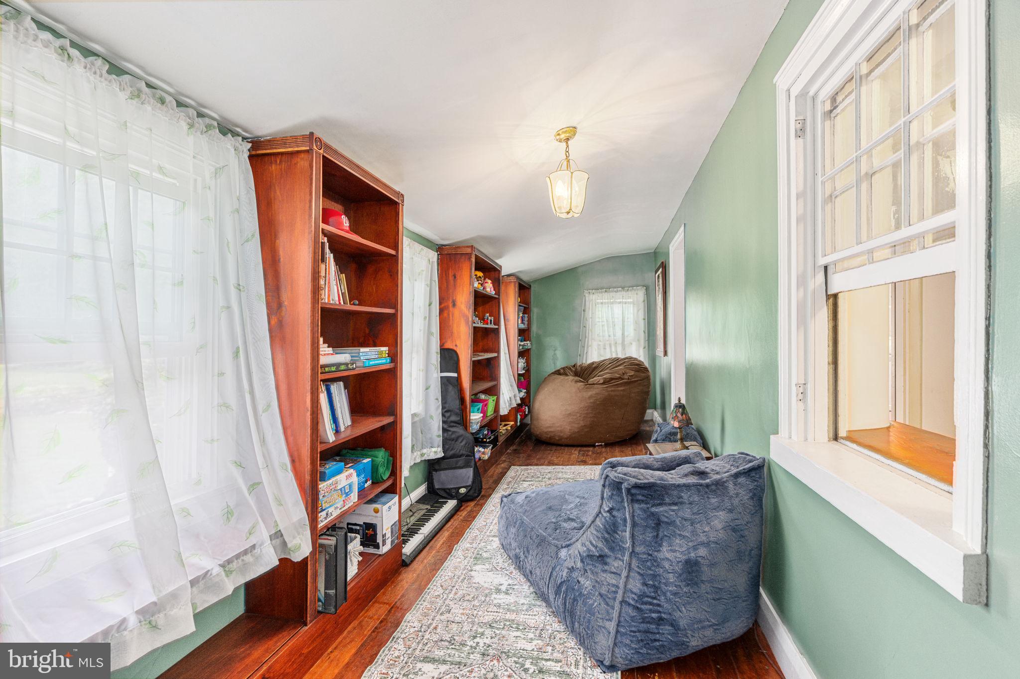 4701 Edges Mill Road Downingtown, PA 19335 - Photo 10 of 55 a living room with furniture and a window