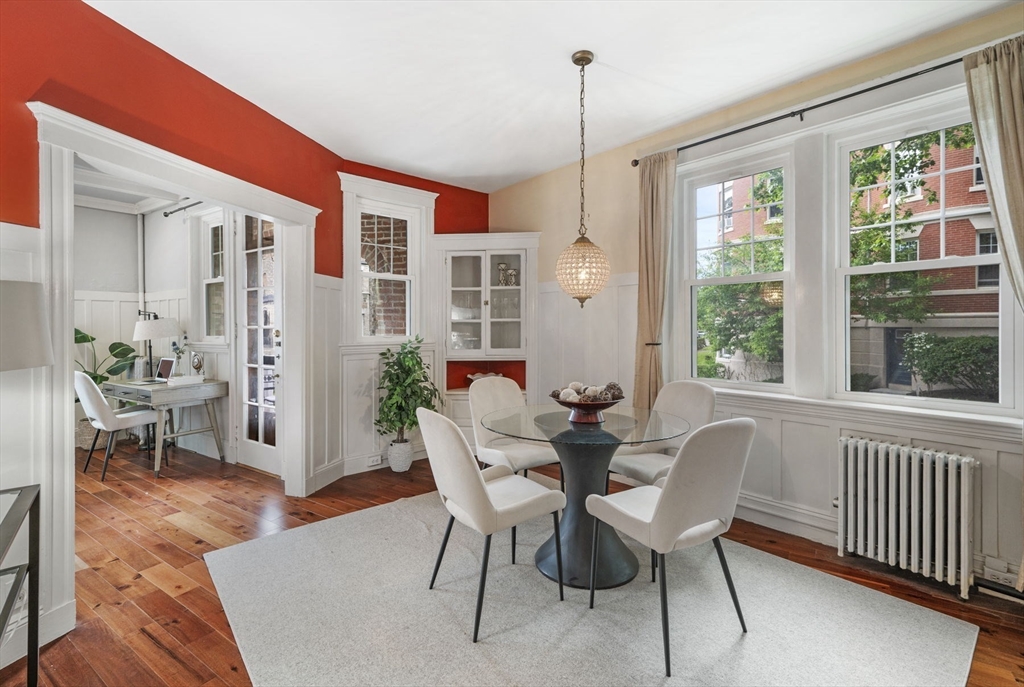 34 Garrison Road, Unit 2 Brookline, MA 02445 - Photo 12 of 21 a view of a dining room with furniture window and wooden floor