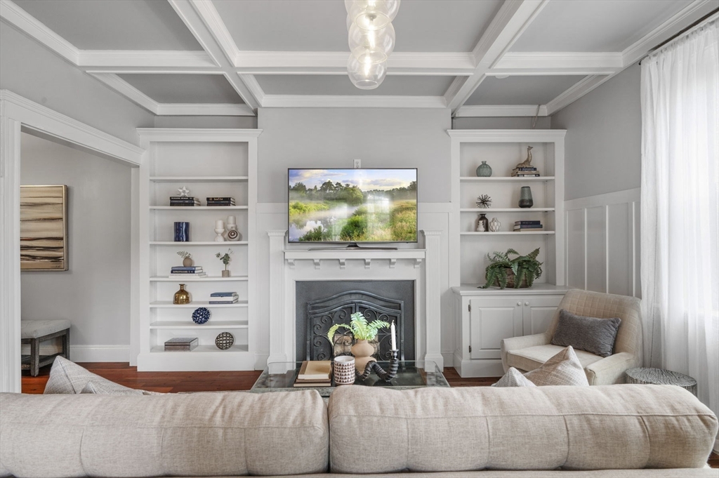 34 Garrison Road, Unit 2 Brookline, MA 02445 - Photo 3 of 21 a living room with furniture and a fireplace