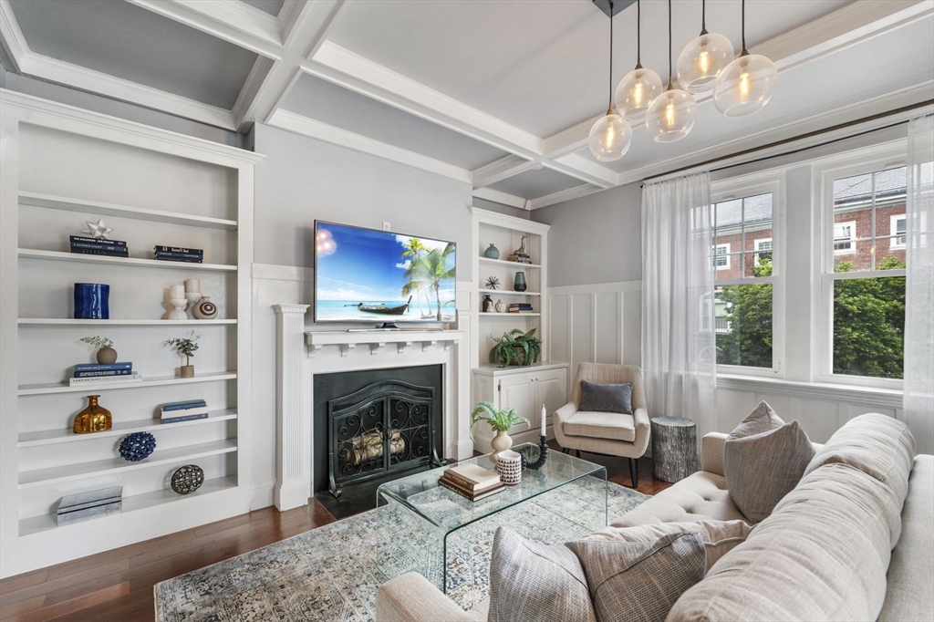 34 Garrison Road, Unit 2 Brookline, MA 02445 - Photo 5 of 21 a living room with furniture fireplace and a window