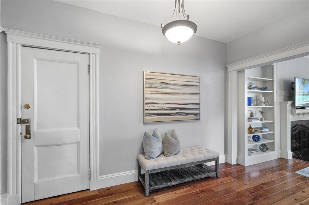 34 Garrison Road, Unit 2 Brookline, MA 02445 - Photo 6 of 21 a bedroom with furniture and a window