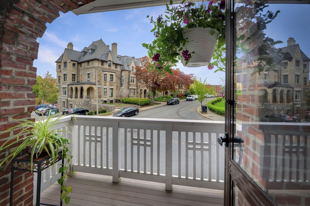 34 Garrison Road, Unit 2 Brookline, MA 02445 - Photo 8 of 21 a view of city from a balcony