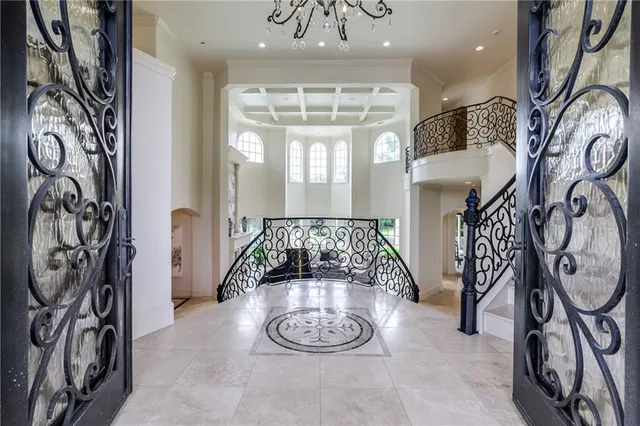 a view of an entryway with a chandelier