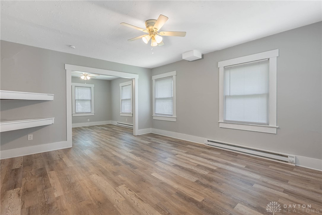2118 Hillside Avenue Springfield, OH 45503 - Photo 3 of 28 This living area features ample natural light and modern flooring, creating an inviting atmosphere.