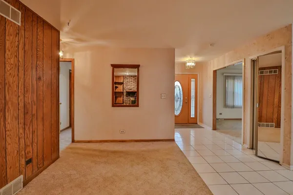 a view of a livingroom with a staircase
