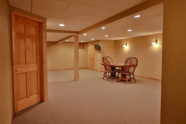 a view of a storage & utility room with wooden floor