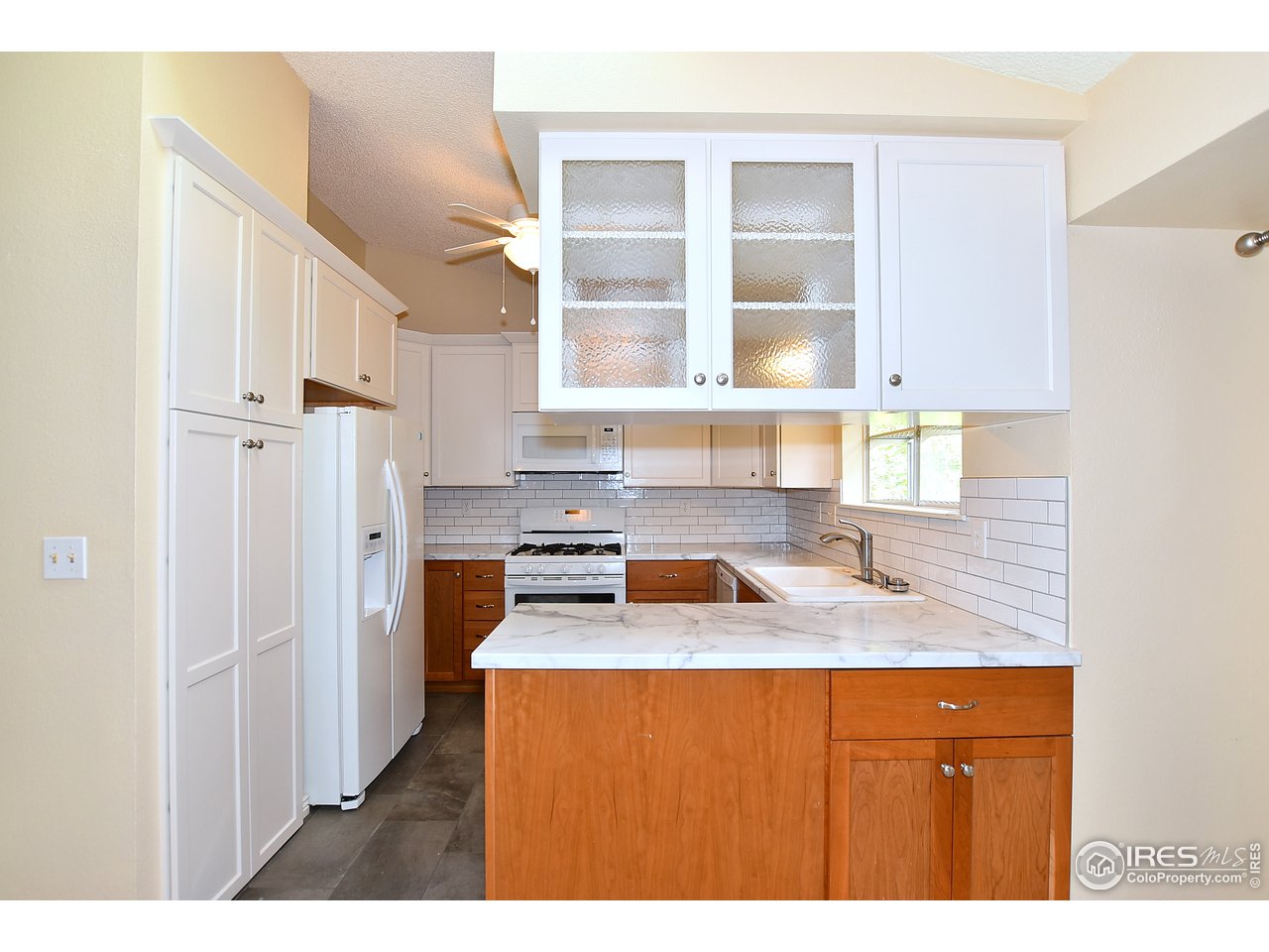 2300 Antelope Road Fort Collins, CO 80525 - Photo 9 of 40 Bright kitchen