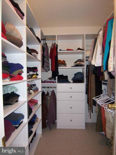 6613 Pebble Brooke Road Baltimore, MD 21209 - Photo 25 of 28 1 of 2 master bedroom walk-in closet w/organizers