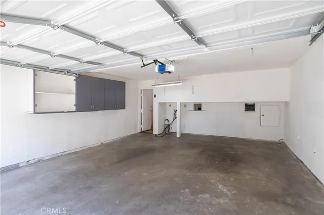 a swimming pool with outdoor seating and yard