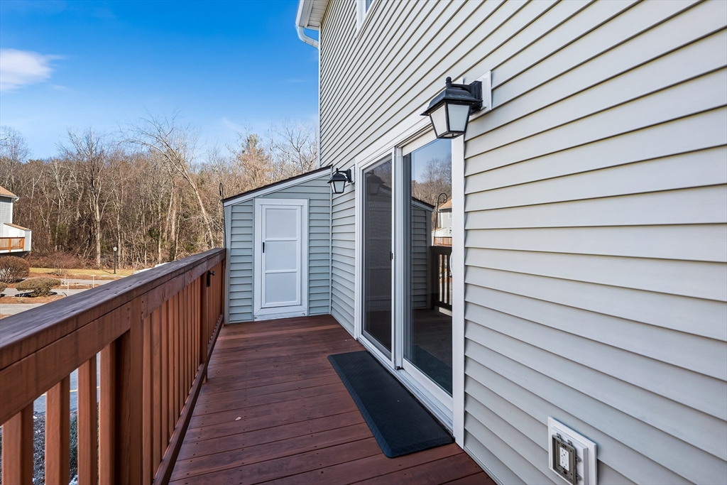 176 Patrick Road, Unit 176 Tewksbury, MA 01876 - Photo 17 of 42 a view of balcony