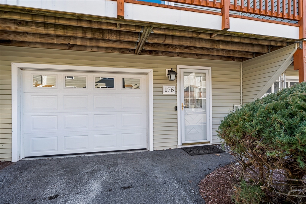 176 Patrick Road, Unit 176 Tewksbury, MA 01876 - Photo 32 of 42 a view of a door of the house