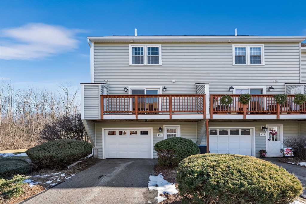 176 Patrick Road, Unit 176 Tewksbury, MA 01876 - Photo 39 of 42 a house view with a outdoor space