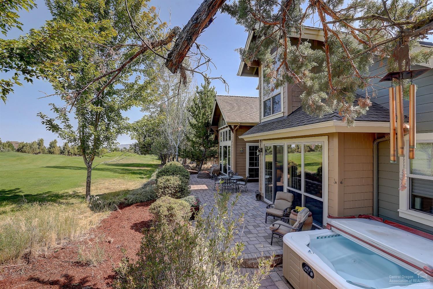 8915 Merlin Drive Redmond, OR 97756 - Photo 21 of 25 Back patio and hot tub