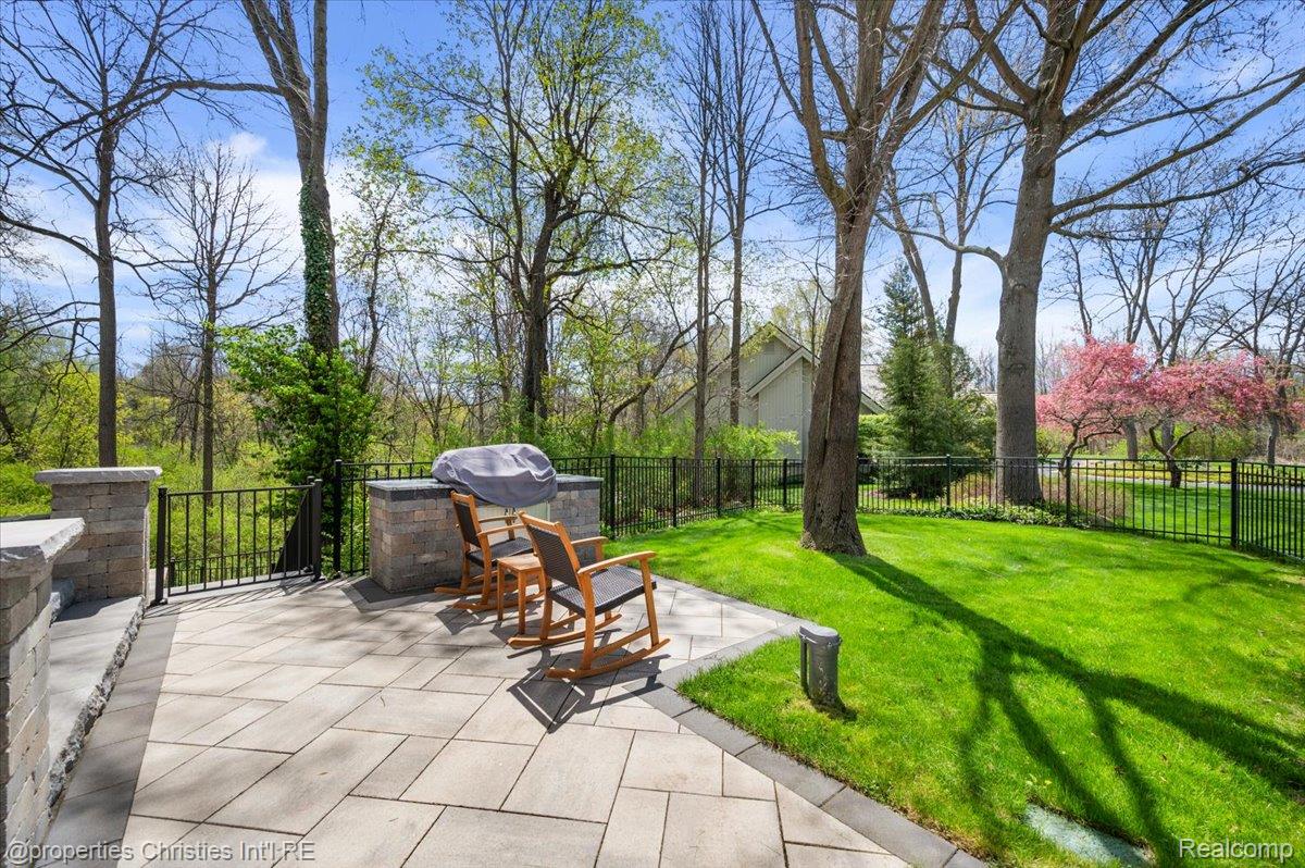 1071 Woodbridge Lane Rochester, MI 48306 - Photo 65 of 76 Fenced backyard with a patio area