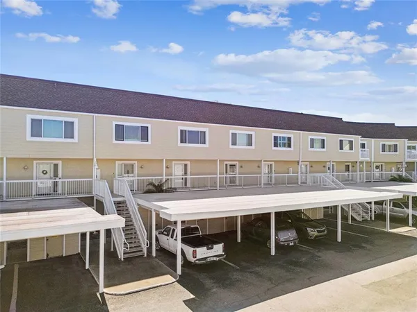 a view of a kitchen cabinets and wooden floor
