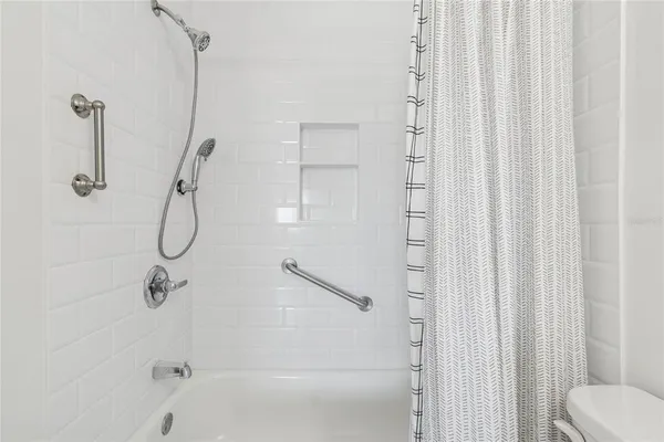 an aerial view of a house with outdoor space