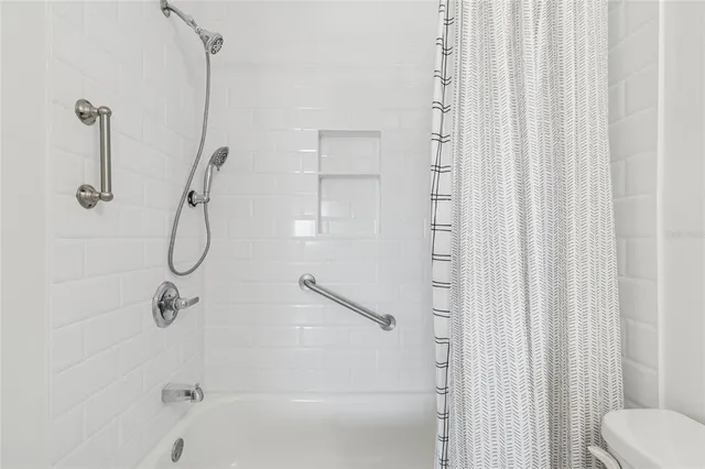 an aerial view of a house with outdoor space