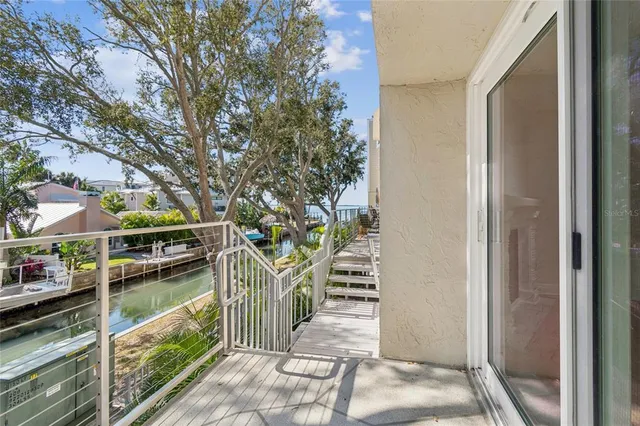 a view of a swimming pool with a house