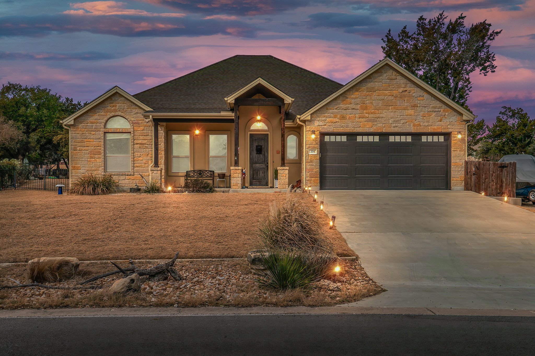 a front view of a house with yard