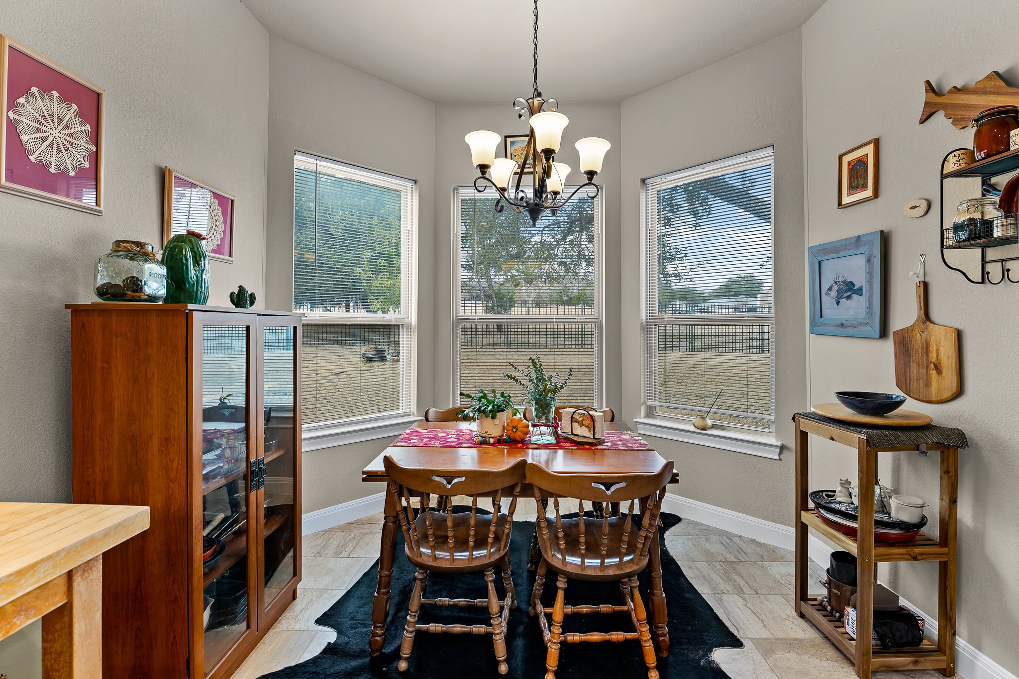204 Venture Boulevard South Point Venture, TX 78645 - Photo 18 of 40 a view of a dining room with furniture window and outside view