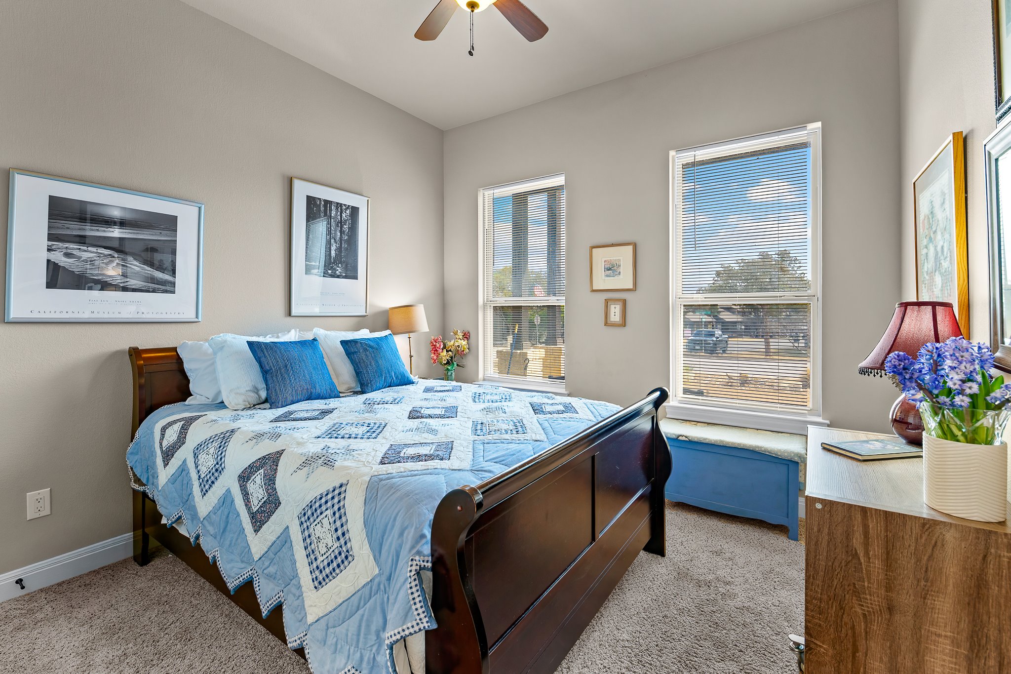 204 Venture Boulevard South Point Venture, TX 78645 - Photo 20 of 40 a bed sitting in a bedroom next to a window