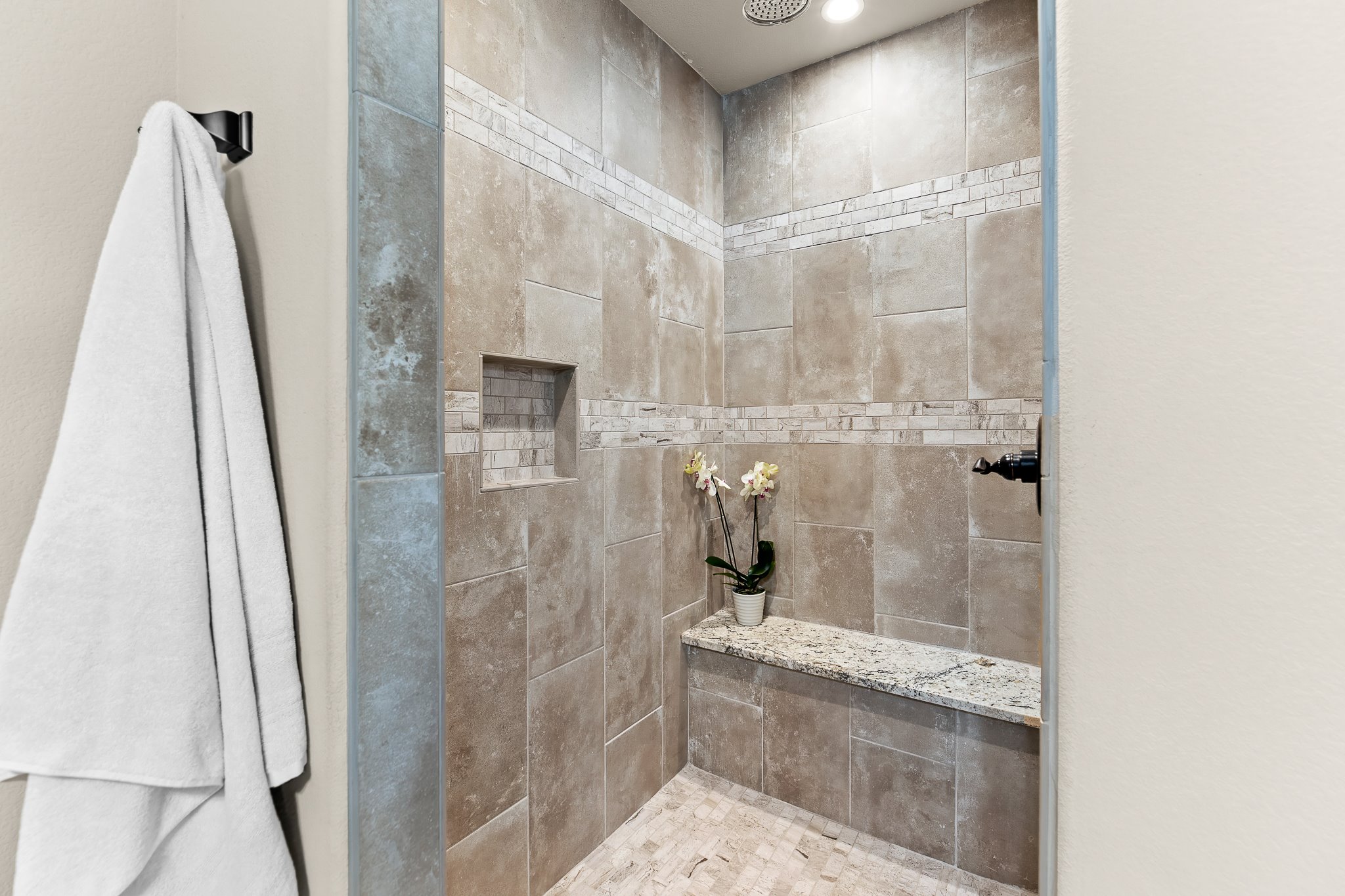 204 Venture Boulevard South Point Venture, TX 78645 - Photo 27 of 40 a bathroom with a granite countertop shower a sink and a mirror