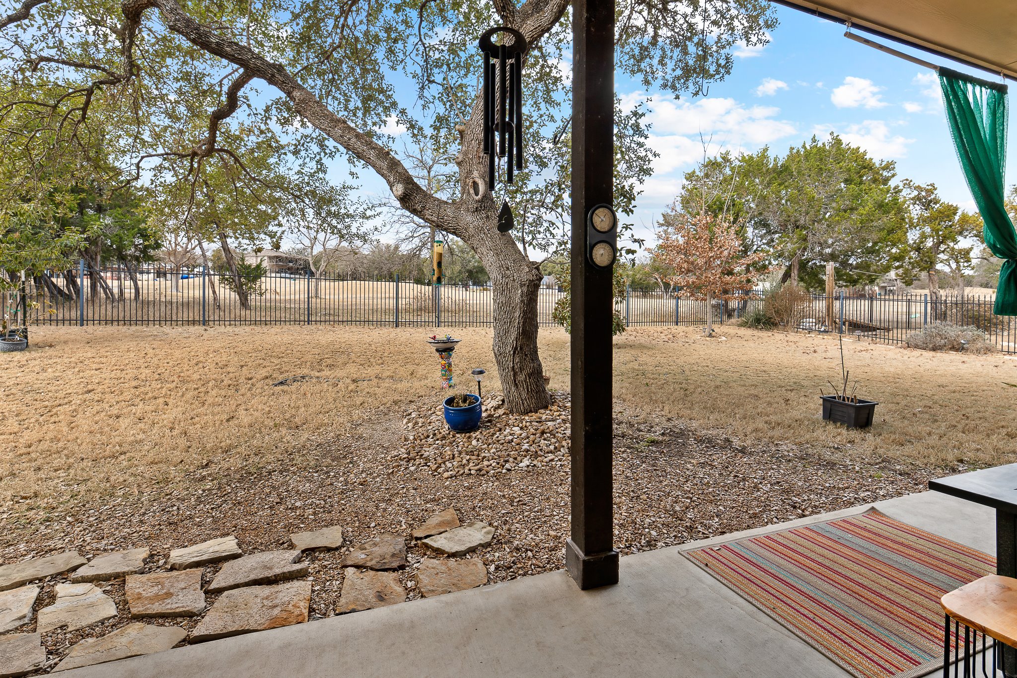 204 Venture Boulevard South Point Venture, TX 78645 - Photo 30 of 40 a view of a yard with trees
