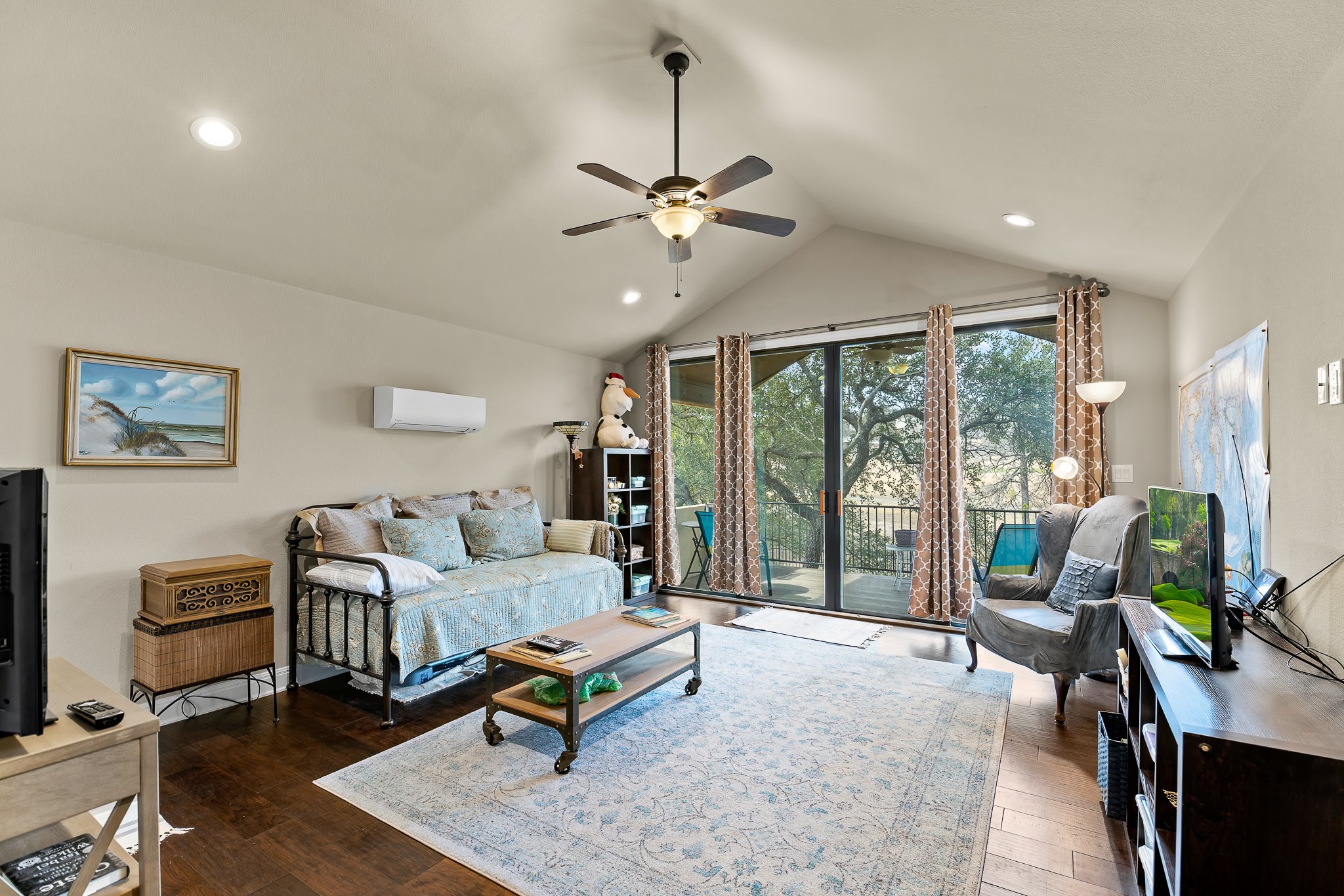 204 Venture Boulevard South Point Venture, TX 78645 - Photo 35 of 40 a living room with furniture and a large window