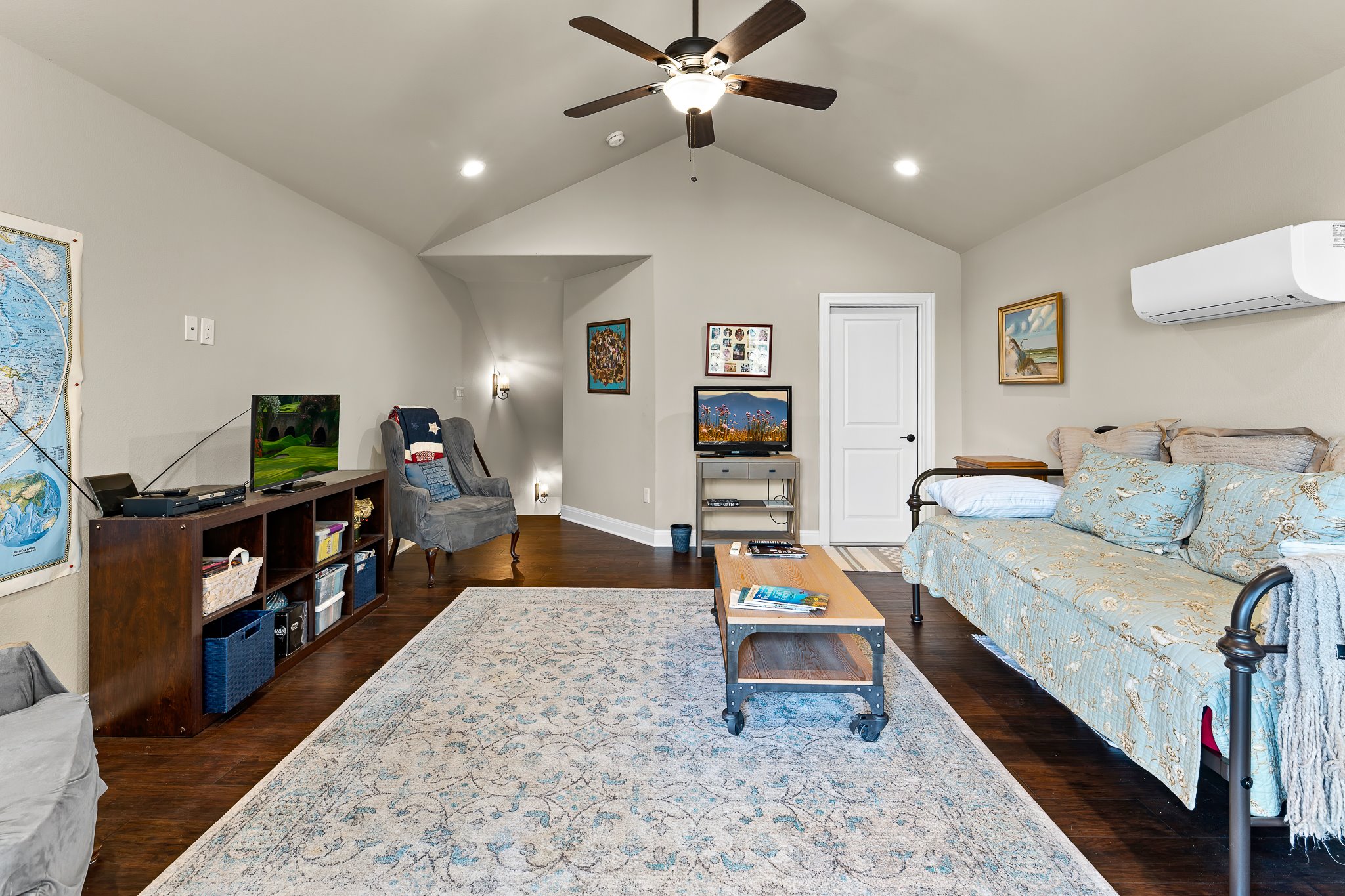 204 Venture Boulevard South Point Venture, TX 78645 - Photo 36 of 40 a living room with furniture and a flat screen tv