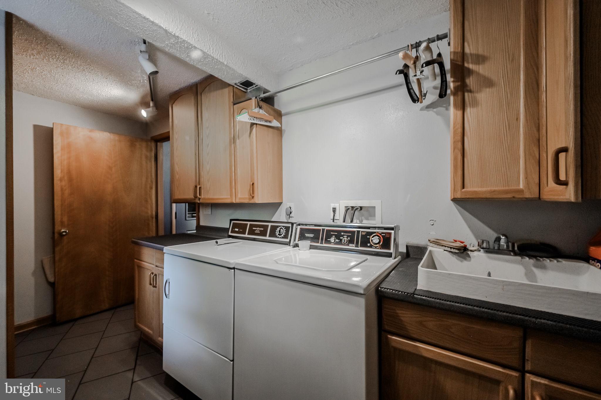 33 Morgan Hollow Way Landenberg, PA 19350 - Photo 14 of 60 The laundry room has lots of storage!