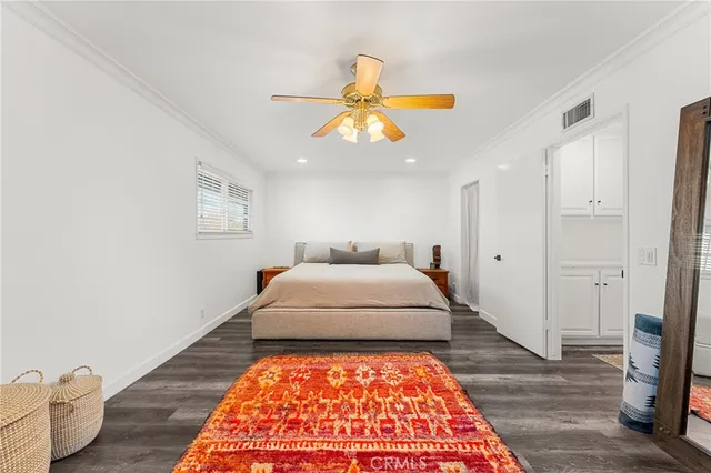 a view of storage and utility room with a window