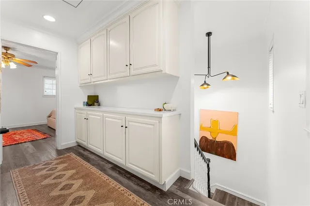 a bedroom with a bed and flat screen tv