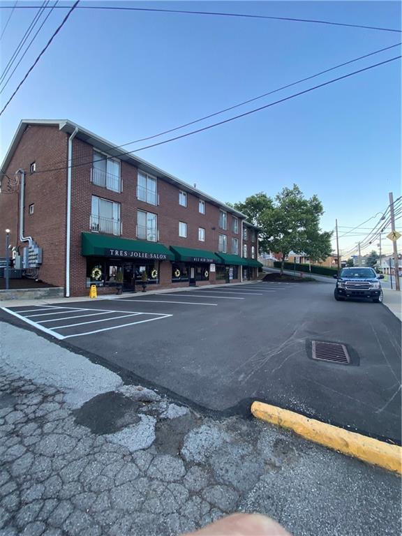 a view of a street with cars
