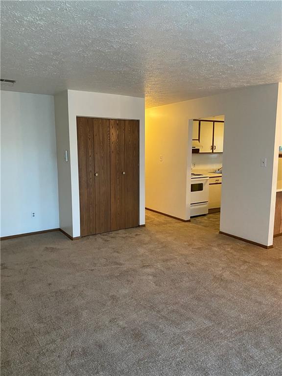 401-407 Freeport Road Pittsburgh, PA 15238 - Photo 16 of 25 a view of an empty room with closet and a window