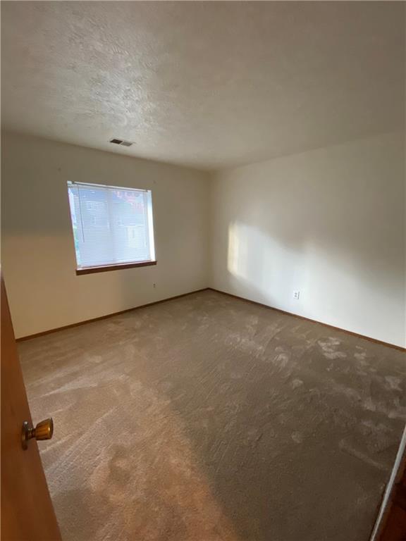 401-407 Freeport Road Pittsburgh, PA 15238 - Photo 22 of 25 an empty room with a window