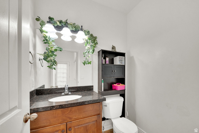 2026 Cres Drive South Mapleton, UT 84664 - Photo 6 of 18 Bathroom featuring toilet and vanity