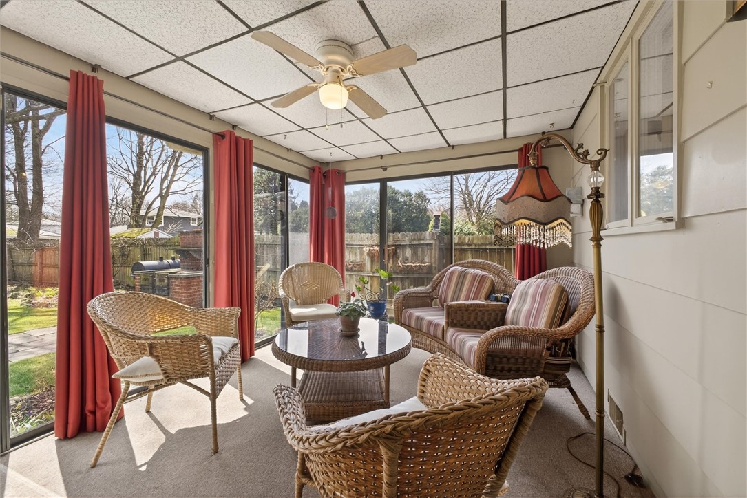 66 Rick Edge Circle Irondequoit, NY 14609 - Photo 32 of 42 3 season room