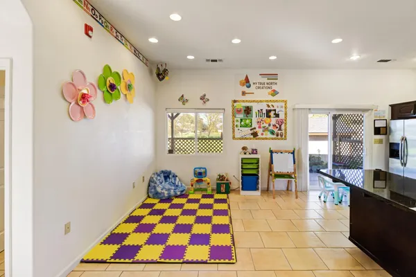 a very nice looking room with many furniture