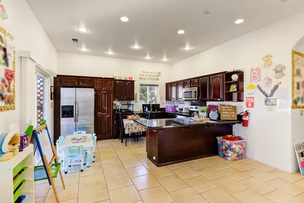 a room with furniture and a flat screen tv