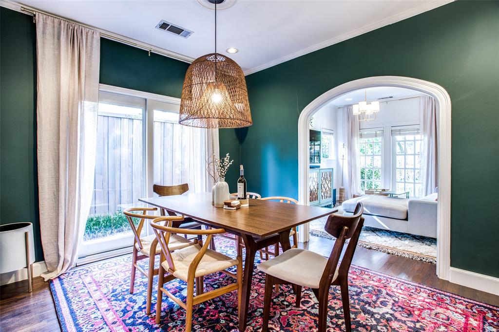 5506 Ridgedale Avenue Dallas, TX 75206 - Photo 5 of 16 a view of a dining room with furniture window and wooden floor