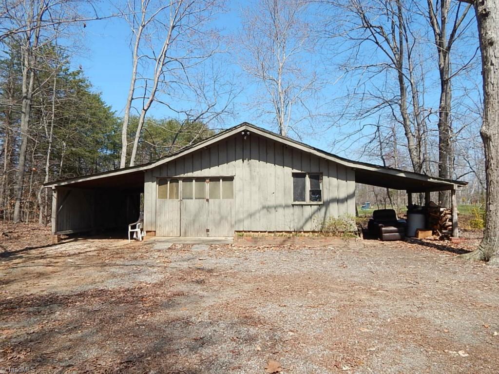 5736 Bunch Road Oak Ridge, NC 27310 - Photo 29 of 30 Detached garage with wired workshop