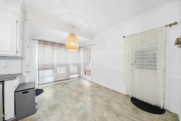 a bathroom with a double vanity sink mirror and bathtub