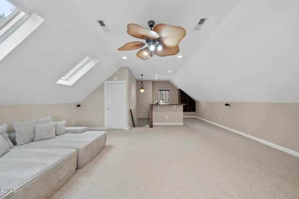 an aerial view of a house with outdoor space