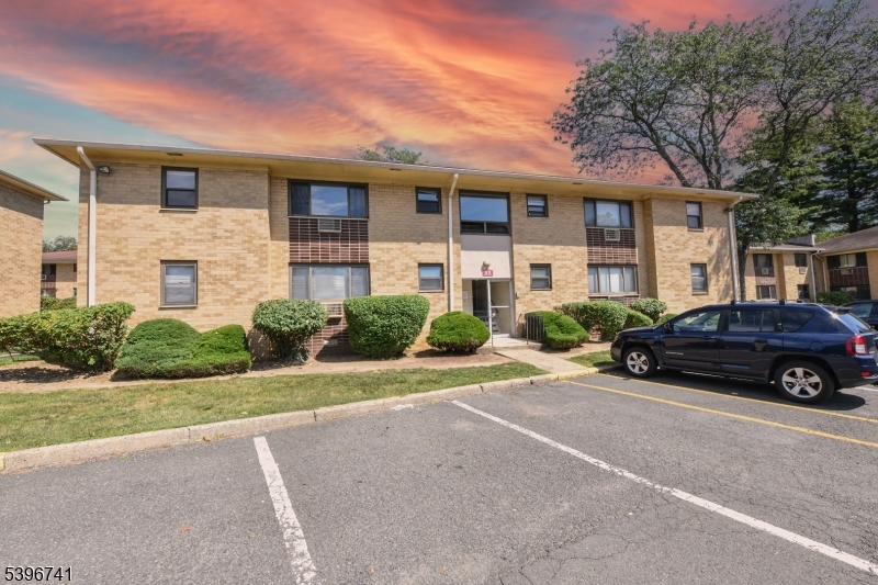a car parked in front of a house