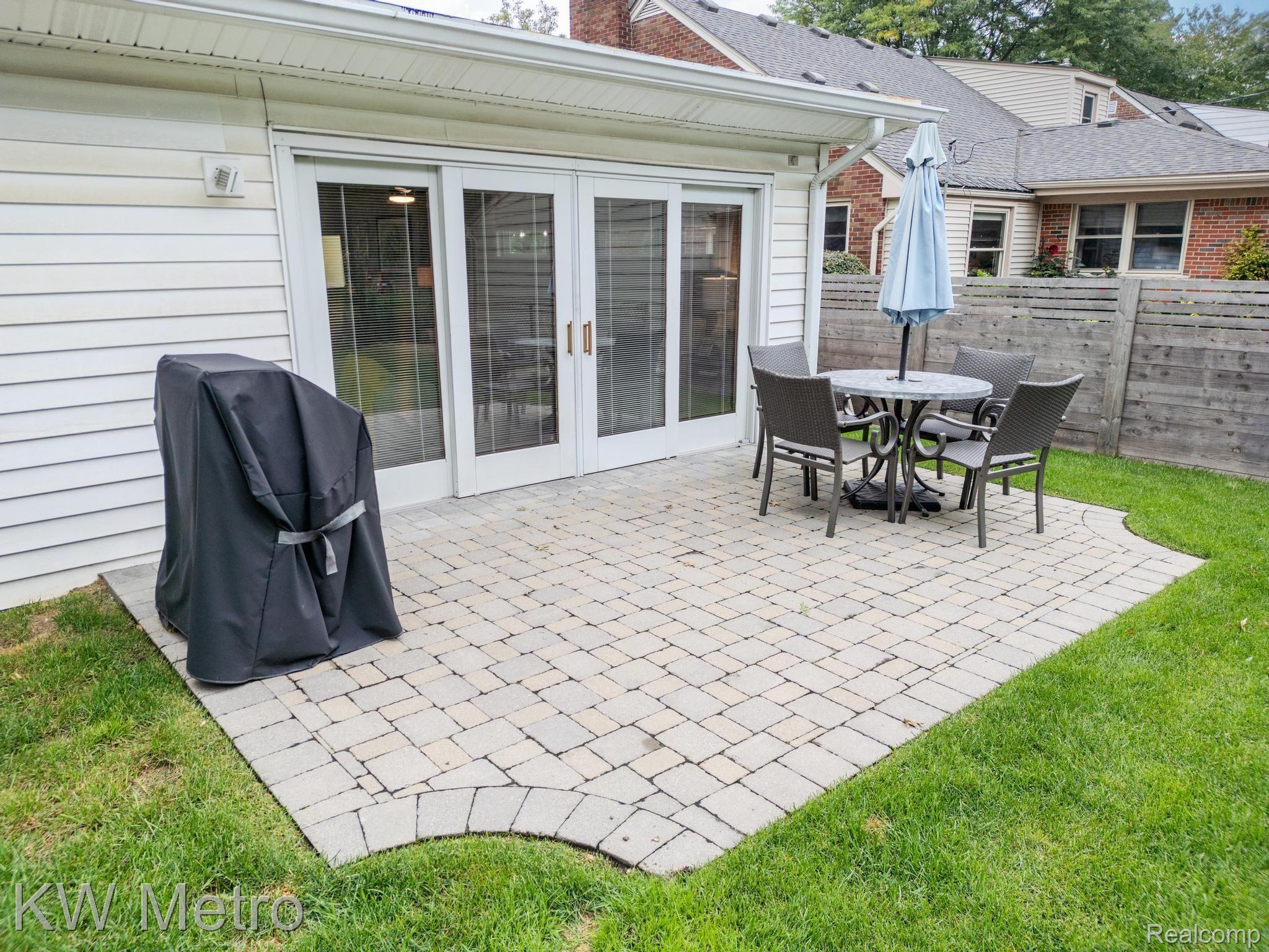 1121 Torrey Road Grosse Pointe, MI 48236 - Photo 38 of 44 Walk-out from Family Room to Patio