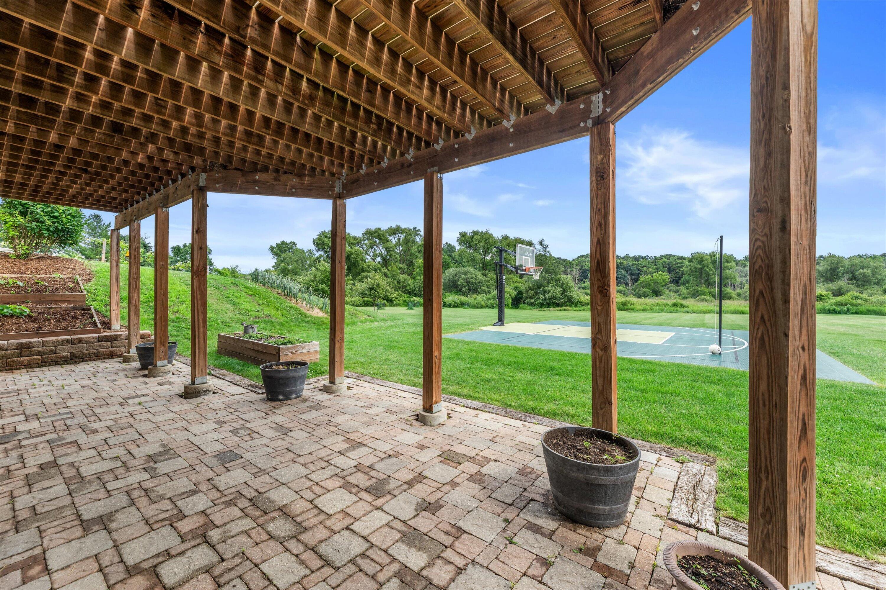 N94-w25549 Norwauk Road Colgate, WI 53017 - Photo 40 of 45 Brick patio under deck