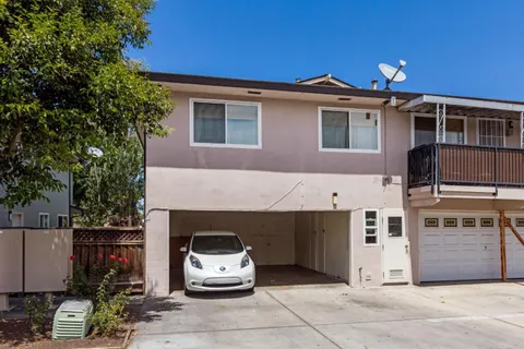 a front view of a house with a garage